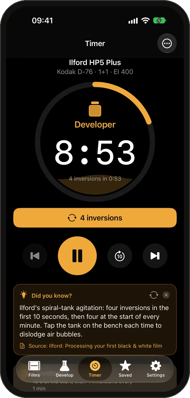 The developing timer with a fact card open